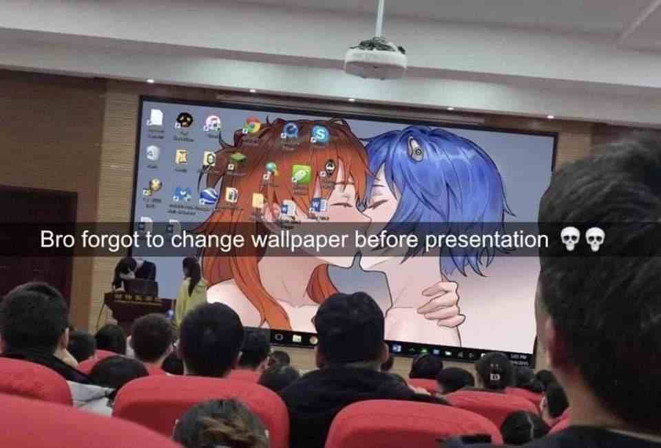 Bro forgot to change wallpaper before presentation