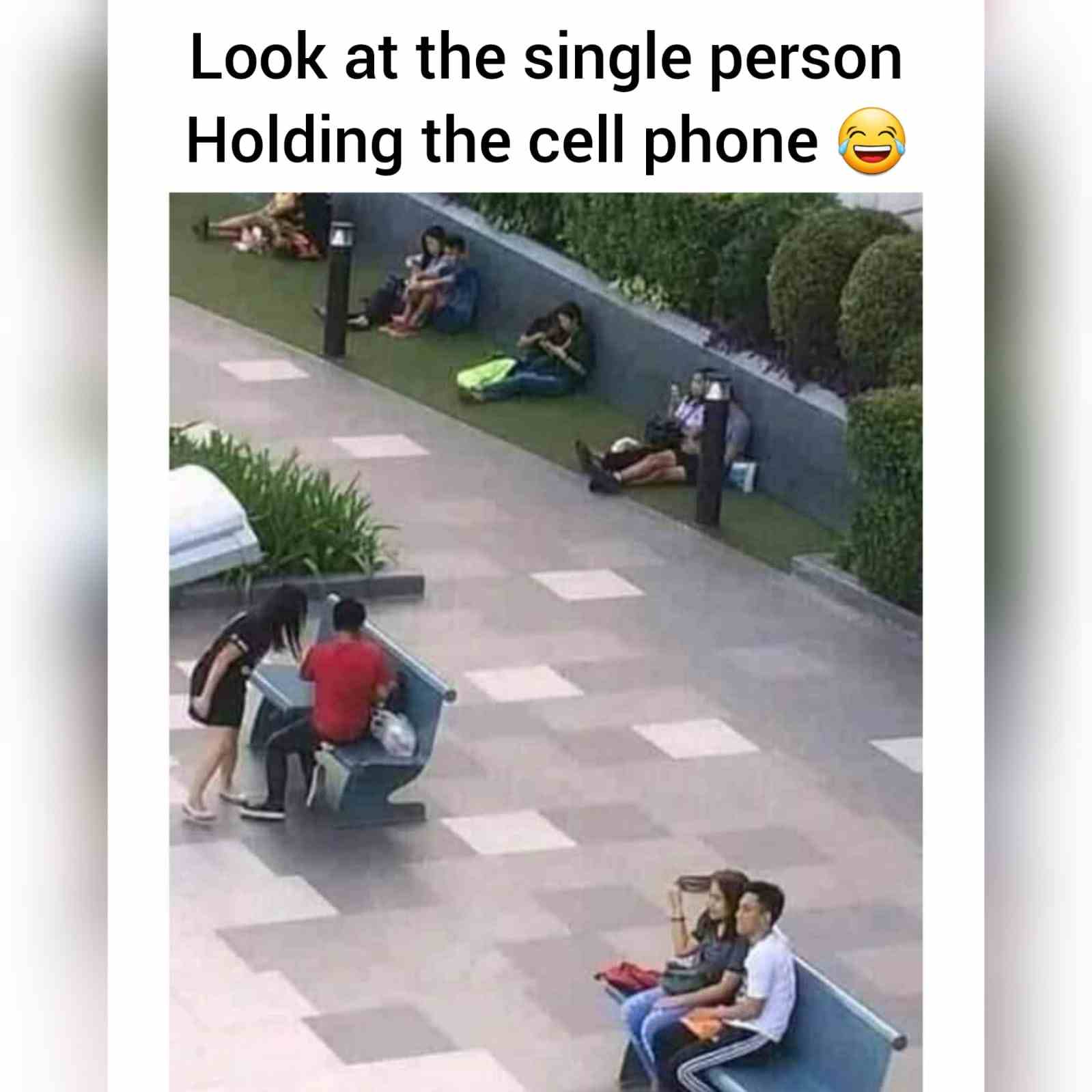 Look at the single person holding the cell phone
