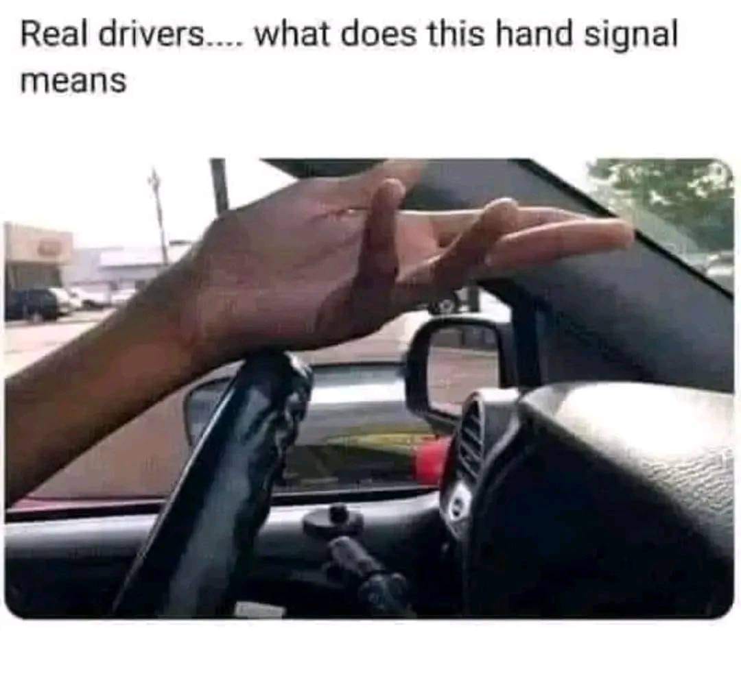 Real drivers... what does this hand signal means